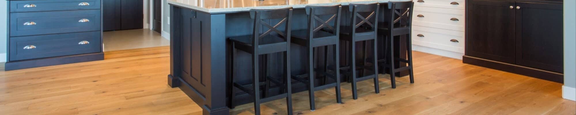 Bright beach-style kitchen with light wood flooring in Bunnell, FL